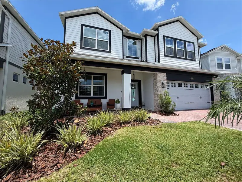 Front exterior of a new home in , St. Cloud, FL, highlighting curb appeal (Image 1). Front exterior of a new home in , St. Cloud, FL, highlighting curb appeal (Image 1).