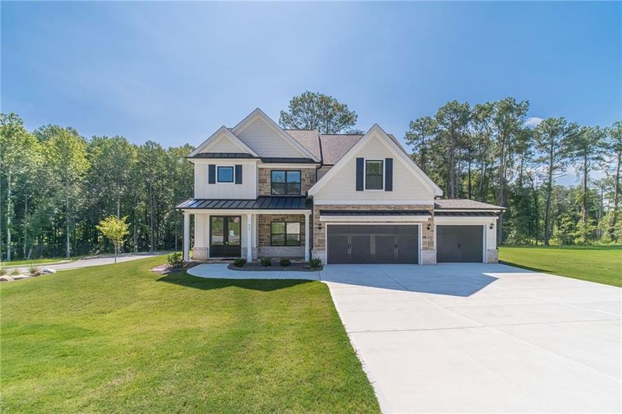 Front exterior of a new home in , Loganville, GA, highlighting curb appeal (Image 27).