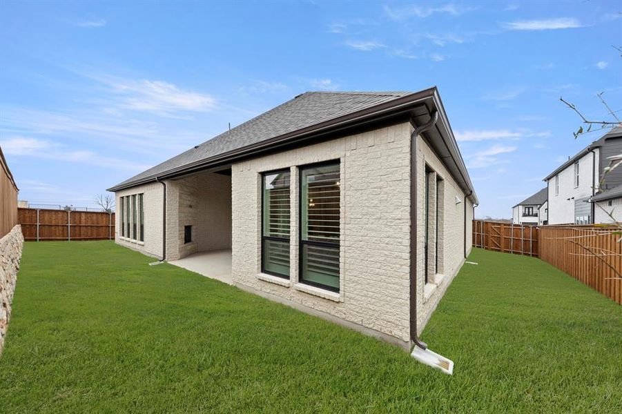 Exterior details and patio area of a home in Nelson Lake Estates, Rockwall (Image 21). Exterior details and patio area of a home in Nelson Lake Estates, Rockwall (Image 21).