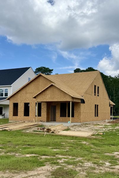 Front exterior of a new home in Creekside at Andrews, Summerville, SC, highlighting curb appeal (Image 17). Front exterior of a new home in Creekside at Andrews, Summerville, SC, highlighting curb appeal (Image 17).