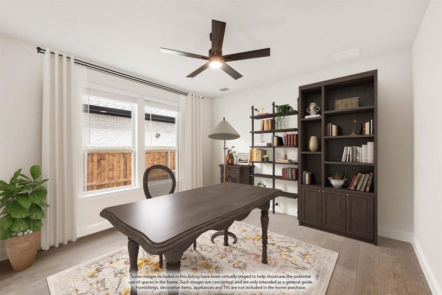 Home office with dark wood desk, built-in bookcase, ceiling fan, and hardwood floors Home office with dark wood desk, built-in bookcase, ceiling fan, and hardwood floors