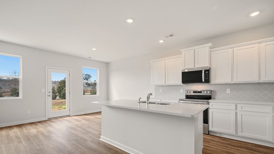 Representative furnished interior of a home built from the Saratoga by D.R. Horton in Shoal Creek, Hampton (Image 7).