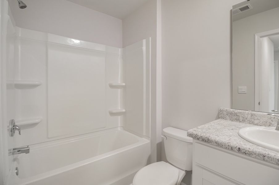 Representative furnished interior of a home built from the LEWIS by D.R. Horton in Cottonwood Place, Tabor City (Image 4).