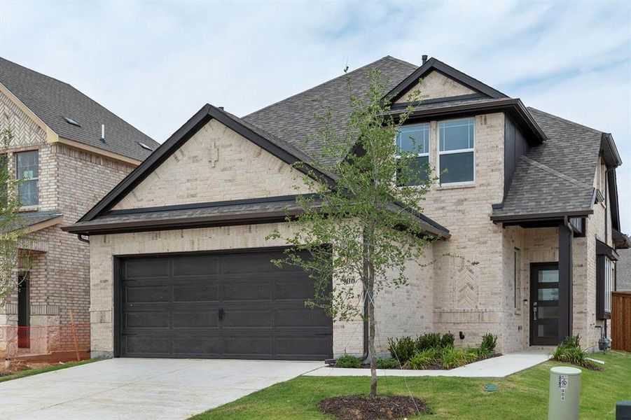 900-collegiate-drive-little-elm-tx-exterior-front-angle 900-collegiate-drive-little-elm-tx-exterior-front-angle