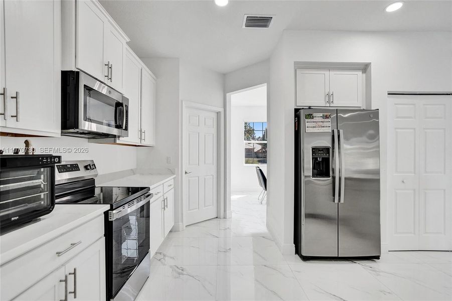Furnished interior view inside a new home in , Loxahatchee (Image 59).