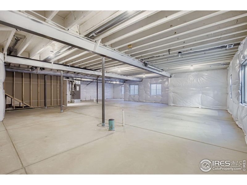 In-progress construction of a new home in RainDance National 60/70, Windsor, CO (Image 25).