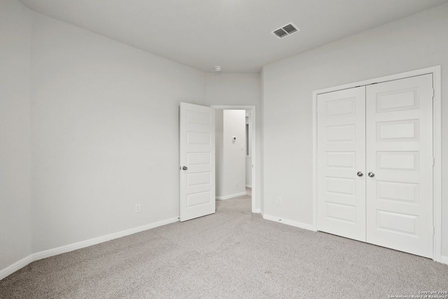 Spacious, unfurnished interior of a new home in Melissa Ranch, San Antonio (Image 18).