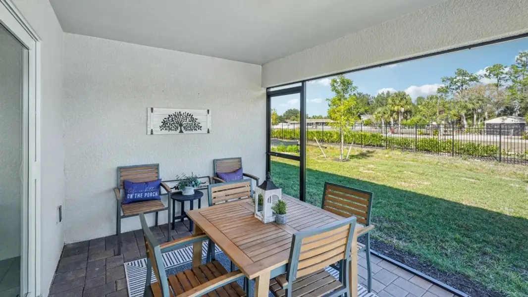 Exterior details and patio area of a home in Coral Bay - Express & Tradition, North Fort Myers (Image 3).