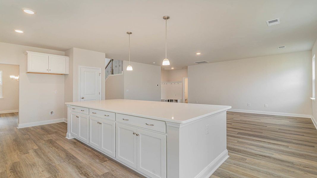 Representative furnished interior of a home built from the FORRESTER by D.R. Horton in Shell Pointe, Gilbert (Image 8).
