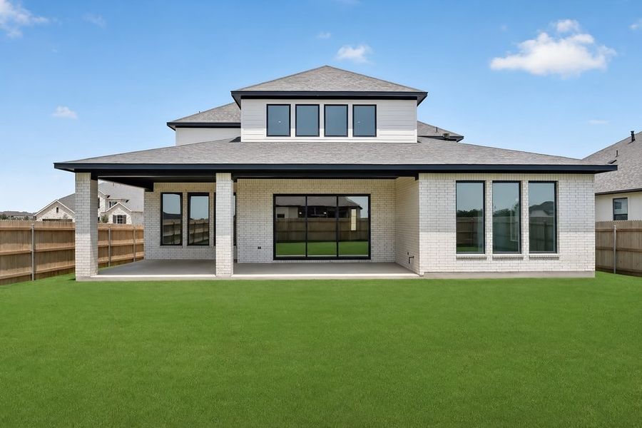 Exterior details and patio area of a home in Santa Rita Ranch, Liberty Hill (Image 21).