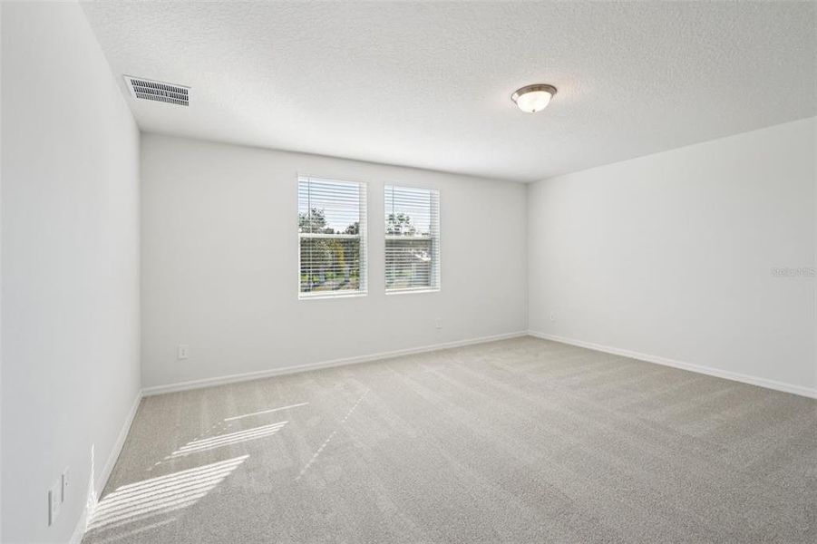 Spacious, unfurnished interior of a new home in The Meadow at Crossprairie, St. Cloud (Image 24).