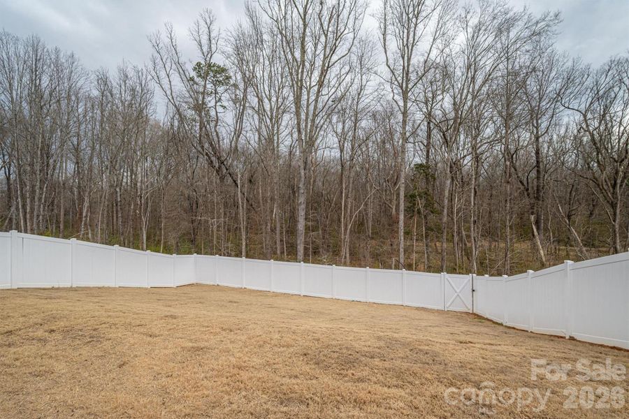 Large backyard full fenced with rear exit