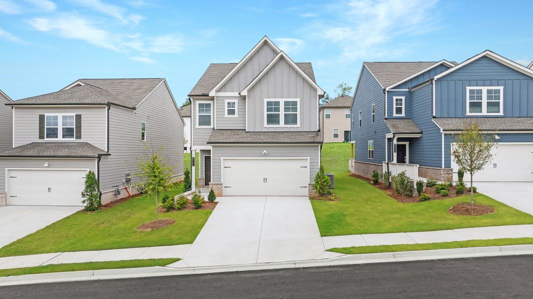 Front exterior of a new home in Timber Ridge, Douglasville, GA, highlighting curb appeal (Image 1). Front exterior of a new home in Timber Ridge, Douglasville, GA, highlighting curb appeal (Image 1).