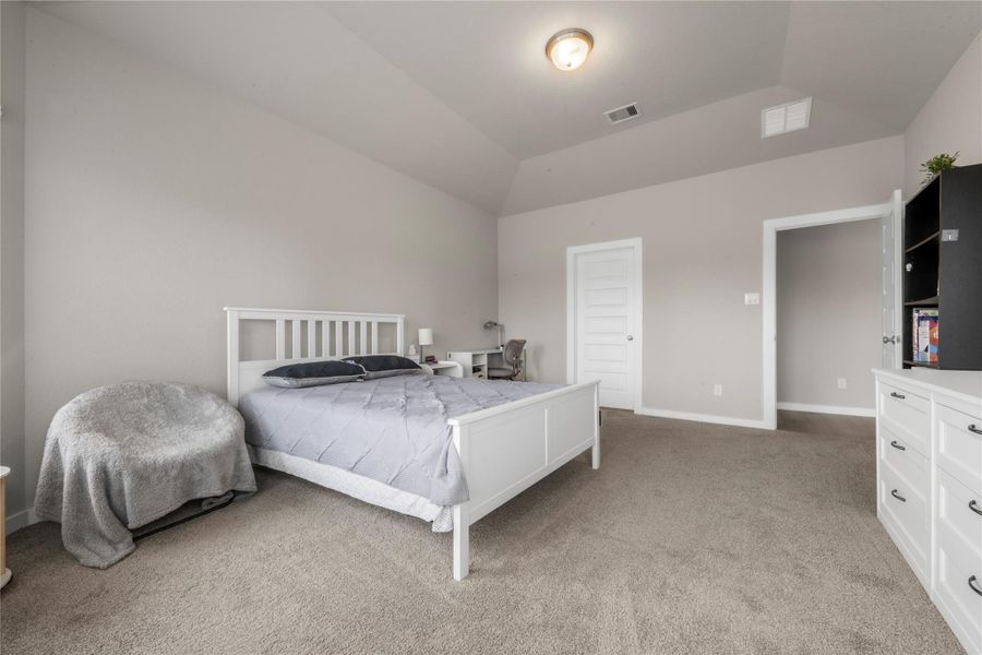 Relaxing primary bedroom retreat offering privacy and comfort, with enough space for a full bedroom set and a calm atmosphere perfect for unwinding after a long day.