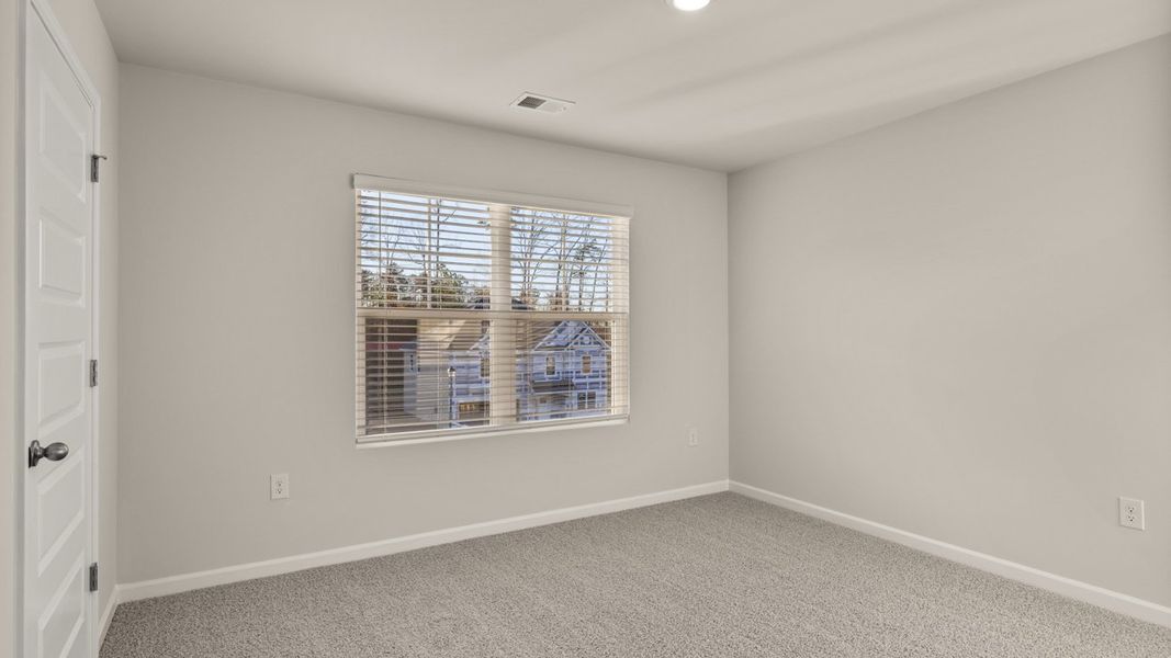 Spacious, unfurnished interior of a new home in Brooks Station, Dacula (Image 26).