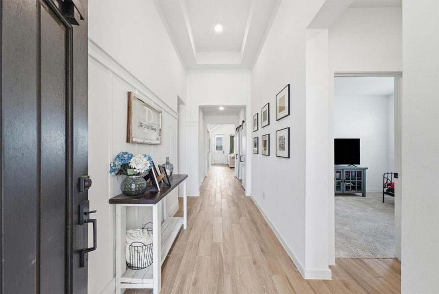Entry is Light and Airy with custom accent wall Entry is Light and Airy with custom accent wall