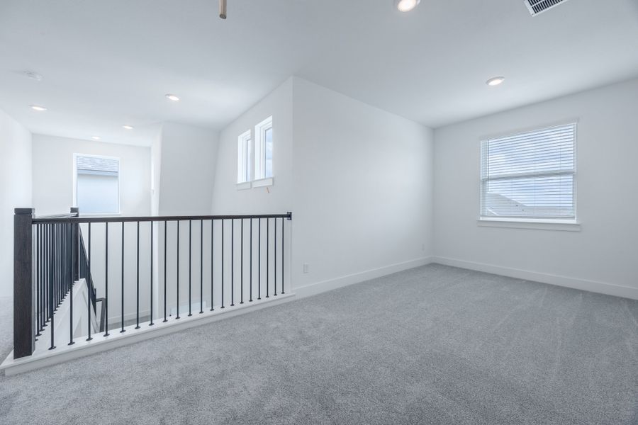 Spacious, unfurnished interior of a new home in Sage Collection – Freedom at Anthem, Kyle (Image 10).