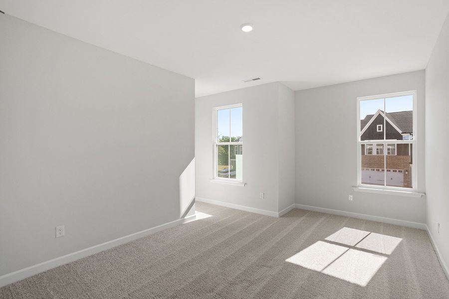 Spacious, unfurnished interior of a new home in Ovation at Sweetbrier, Durham (Image 26).