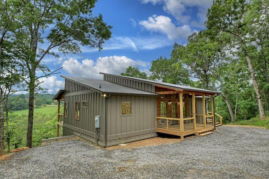 Front exterior of a new home in , Blue Ridge, GA, highlighting curb appeal (Image 24).