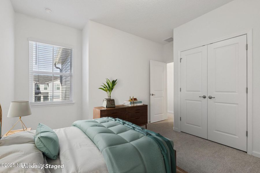 Furnished interior view inside a new home in Brandon Lakes at Silver Landing, St. Augustine (Image 12).