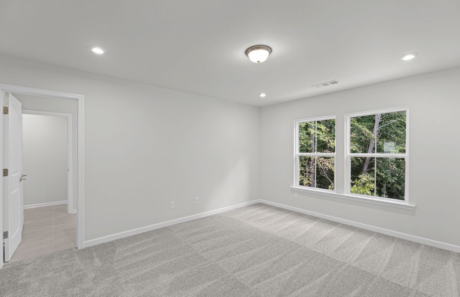 Spacious, unfurnished interior of a new home in Ansley Towns, Cumming (Image 16).