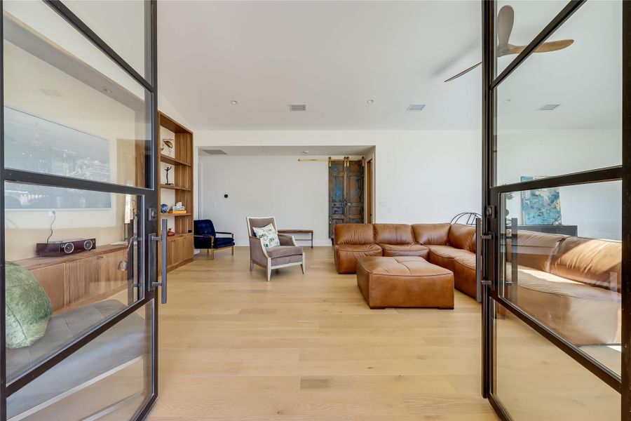 Living area featuring light wood-style floors