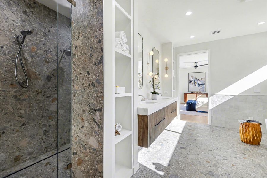 Full bath featuring walk in shower, ensuite bath, double vanity, recessed lighting, and a ceiling fan