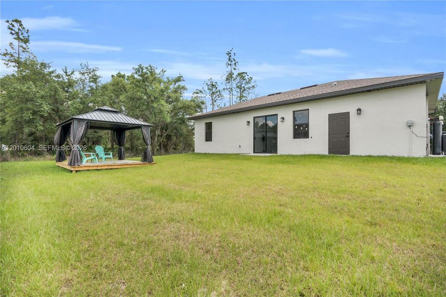 Exterior details and patio area of a home in , Lehigh Acres (Image 3).