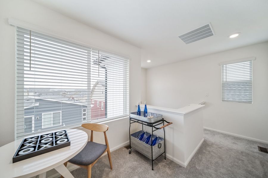 Furnished interior view inside a new home in Reunion, Commerce City (Image 33).