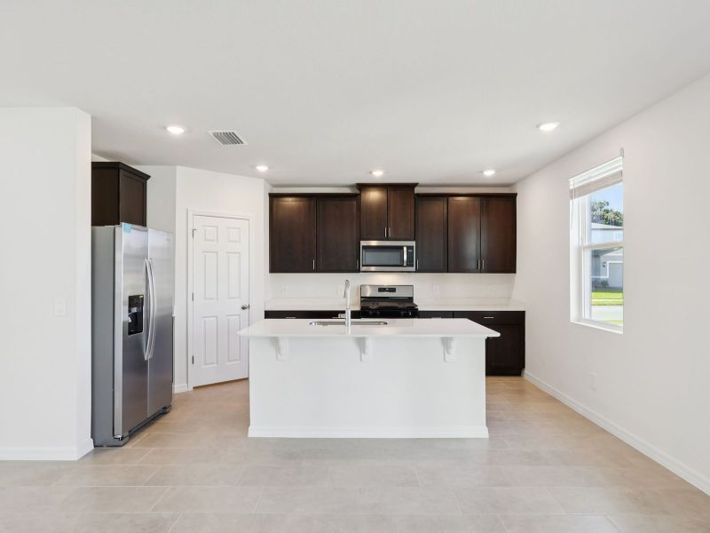 Furnished interior view inside a new home in The Reserve at Twin Lakes, St. Cloud (Image 3).