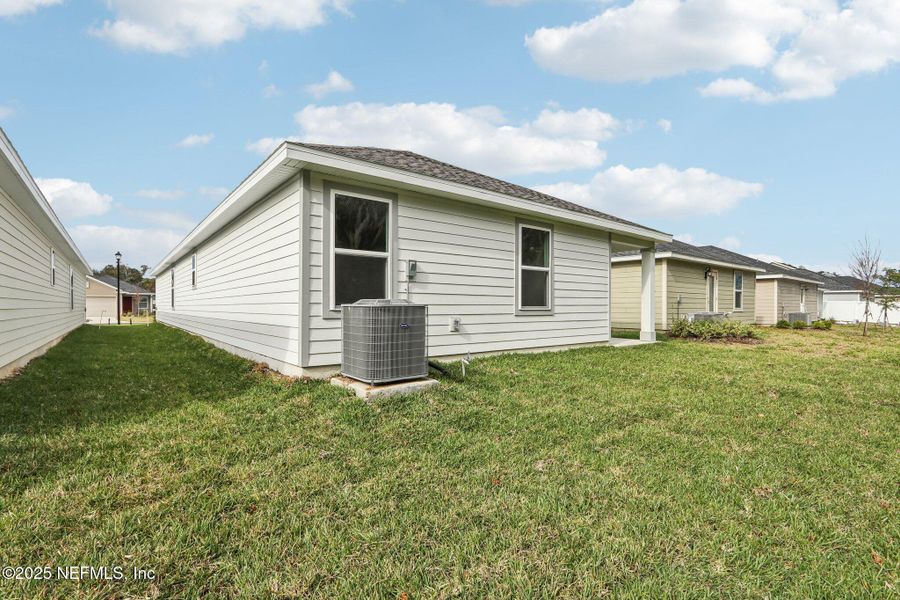 Exterior details and patio area of a home in Kings Landing, Jacksonville (Image 22).