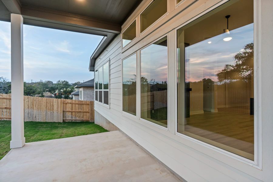 Exterior details and patio area of a home in Lariat, Liberty Hill (Image 30).