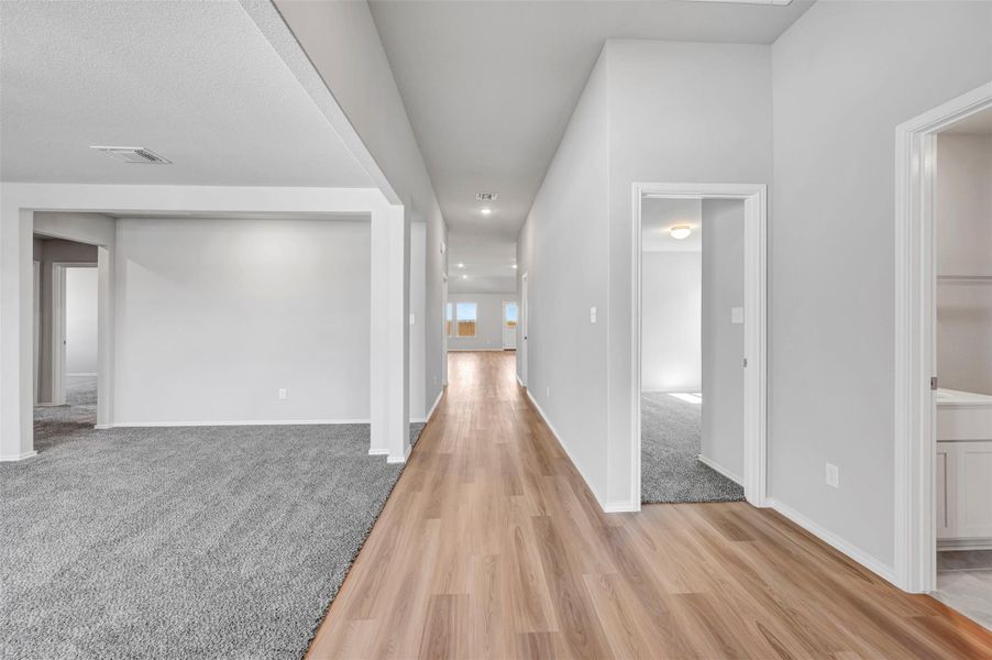 Spacious, unfurnished interior of a new home in Carillon, Manor (Image 23).