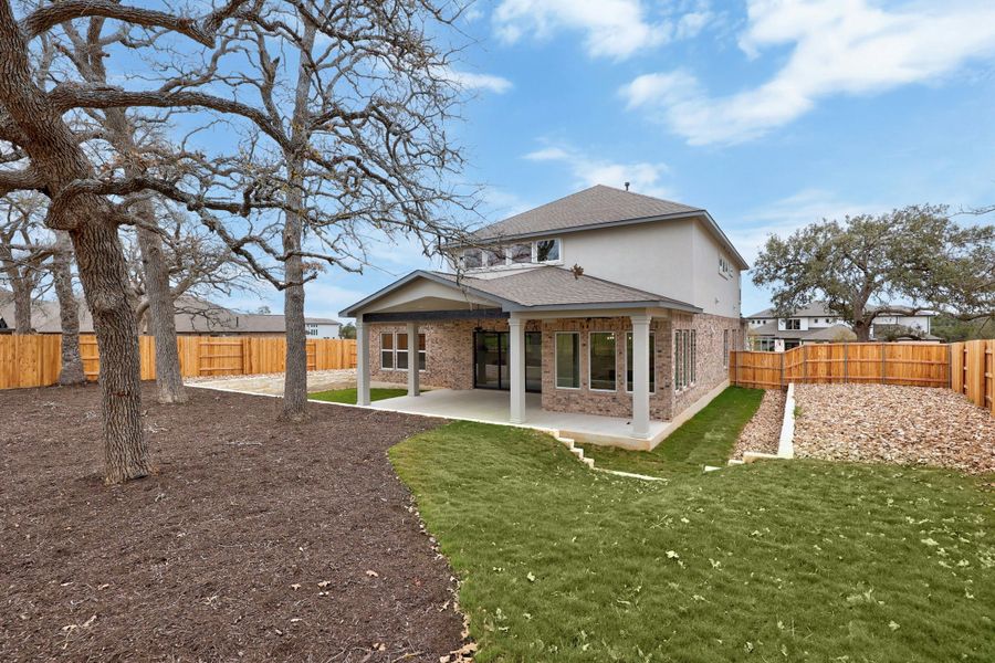 Exterior details and patio area of a home in Caliterra, Dripping Springs (Image 22).