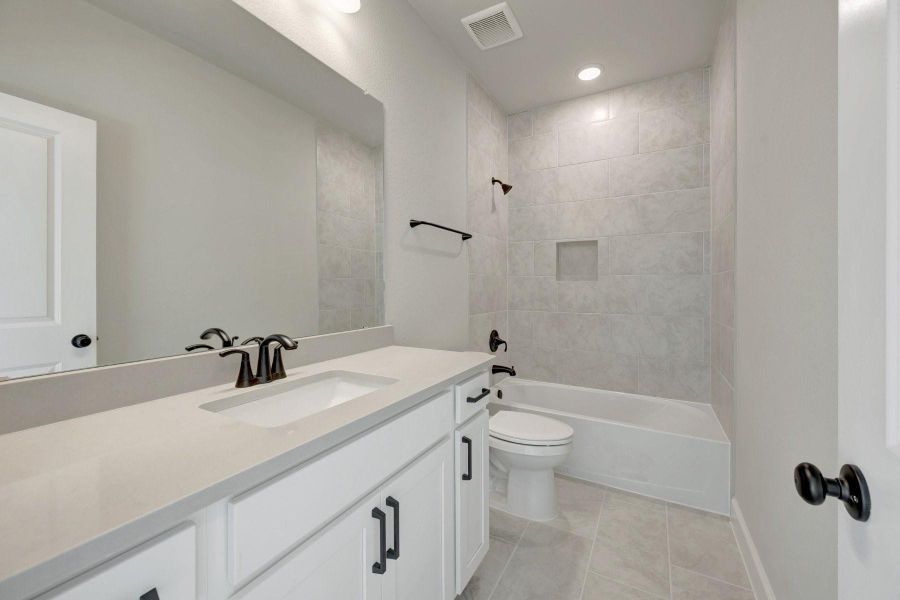 Furnished interior view inside a new home in Sienna - Grove Collection, Missouri City (Image 10). Furnished interior view inside a new home in Sienna - Grove Collection, Missouri City (Image 10).