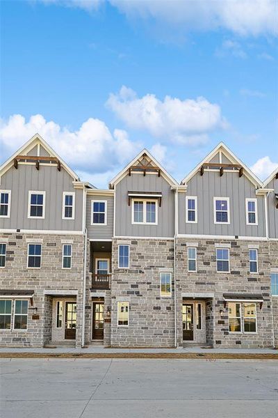 Front exterior of a new home in Collin Creek, Plano, TX, highlighting curb appeal (Image 1).