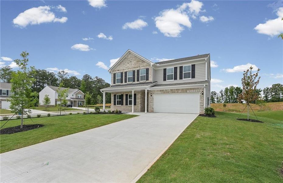 Front exterior of a new home in Anderson Point, McDonough, GA, highlighting curb appeal (Image 18). Front exterior of a new home in Anderson Point, McDonough, GA, highlighting curb appeal (Image 18).