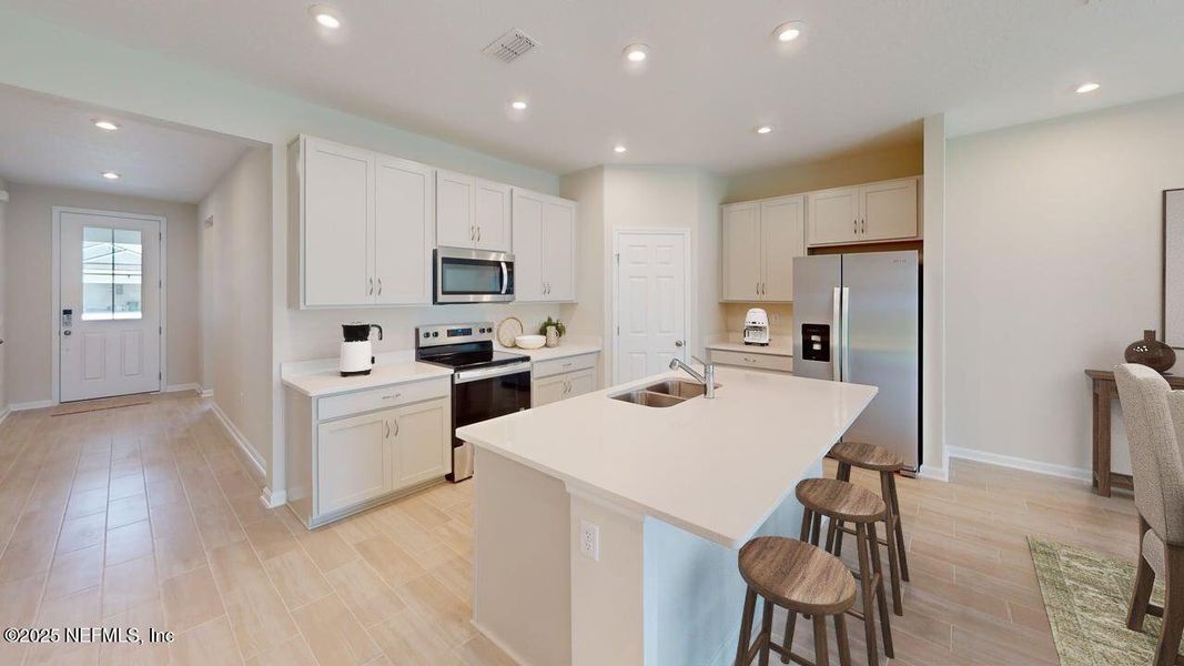 Furnished interior view inside a new home in Sandridge Hills, Green Cove Springs (Image 3).