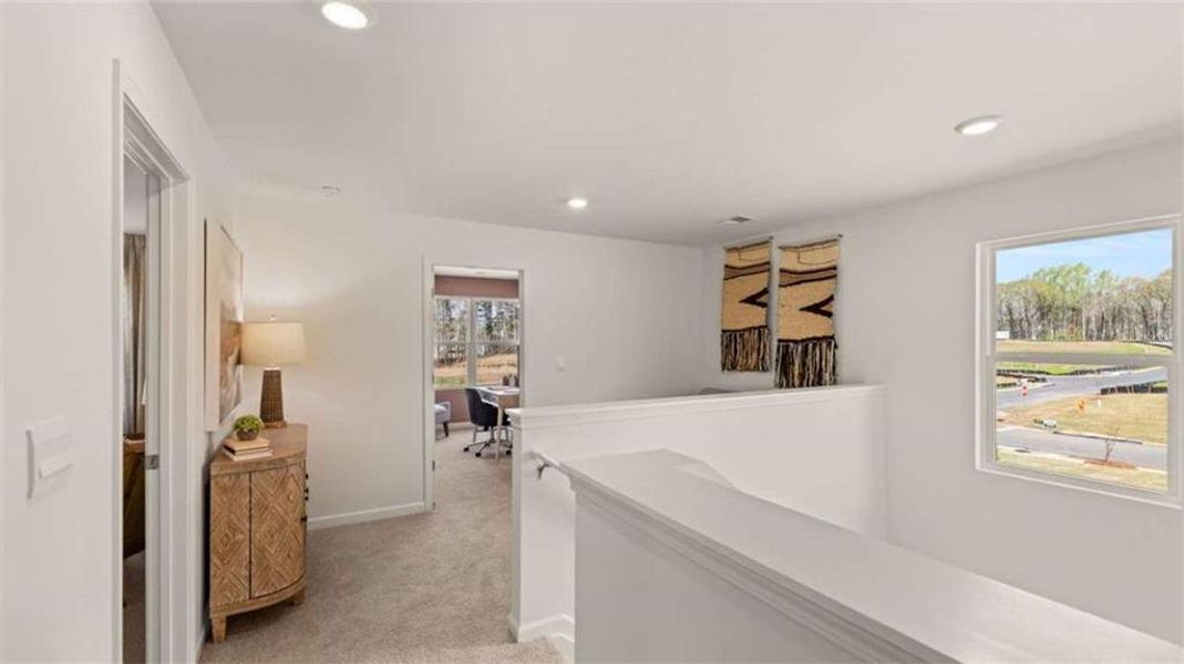 Furnished interior view inside a new home in Oakchase at Hampton, Hampton (Image 23).