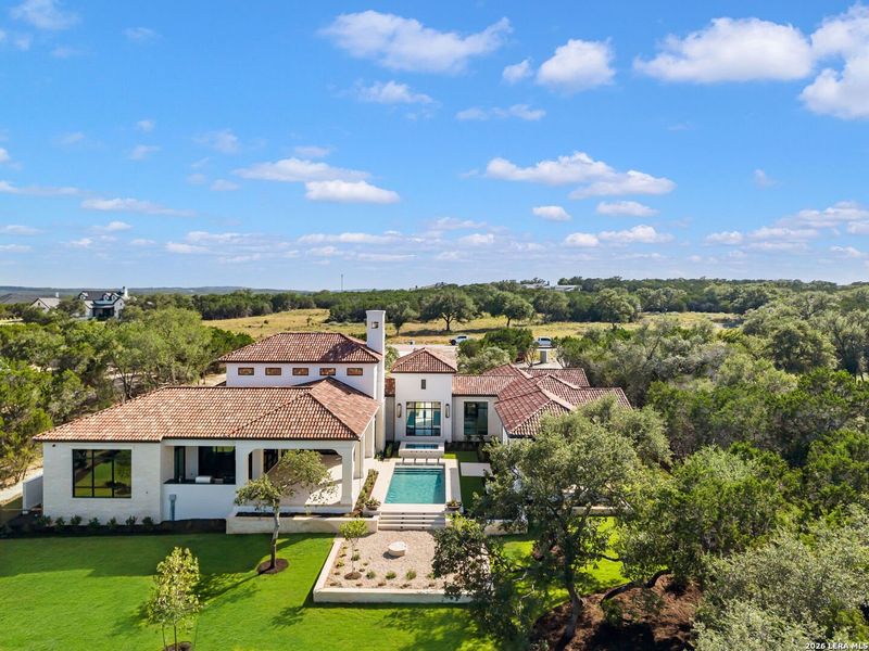 Front exterior of a new home in , Boerne, TX, highlighting curb appeal (Image 13).