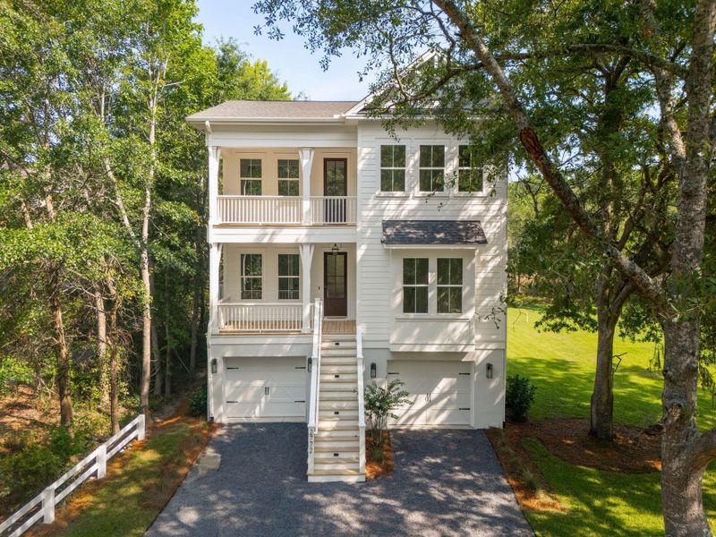 Front exterior of a new home in , Johns Island, SC, highlighting curb appeal (Image 35).