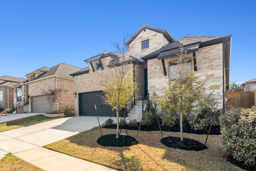 Front exterior of a new home in , Georgetown, TX, highlighting curb appeal (Image 25).