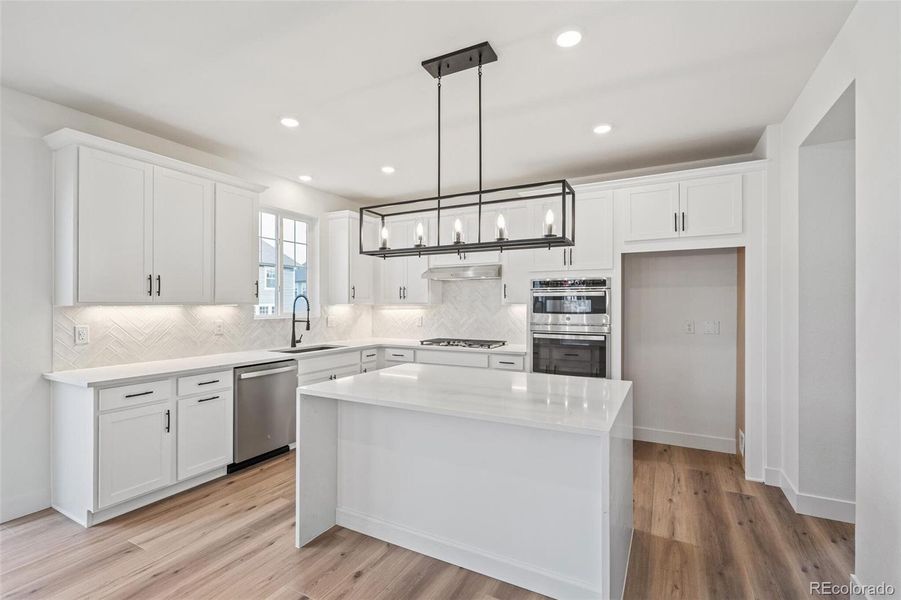 Furnished interior view inside a new home in Windsong, Thornton (Image 9).