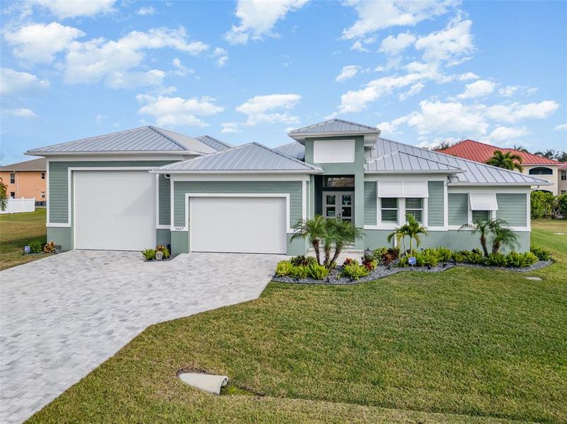 Front exterior of a new home in , Cape Coral, FL, highlighting curb appeal (Image 30).