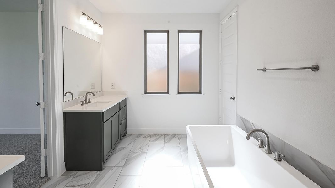 Furnished interior view inside a new home in 6 Creeks 50', Kyle (Image 12).