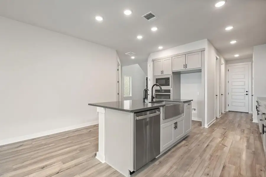 Furnished interior view inside a new home in Flora, Hutto (Image 9).