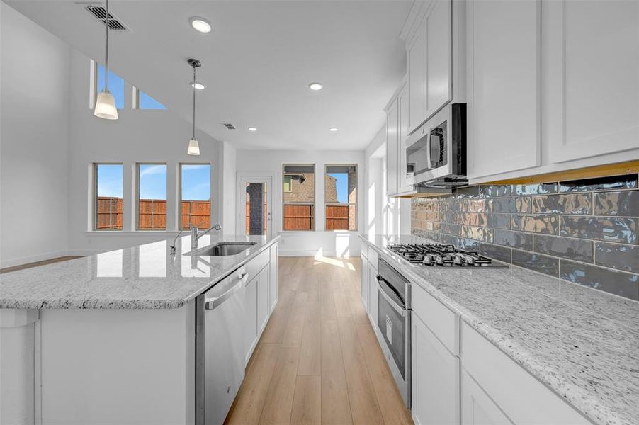 Furnished interior view inside a new home in Lily Creek at Sutton Fields, Aubrey (Image 7). Furnished interior view inside a new home in Lily Creek at Sutton Fields, Aubrey (Image 7).