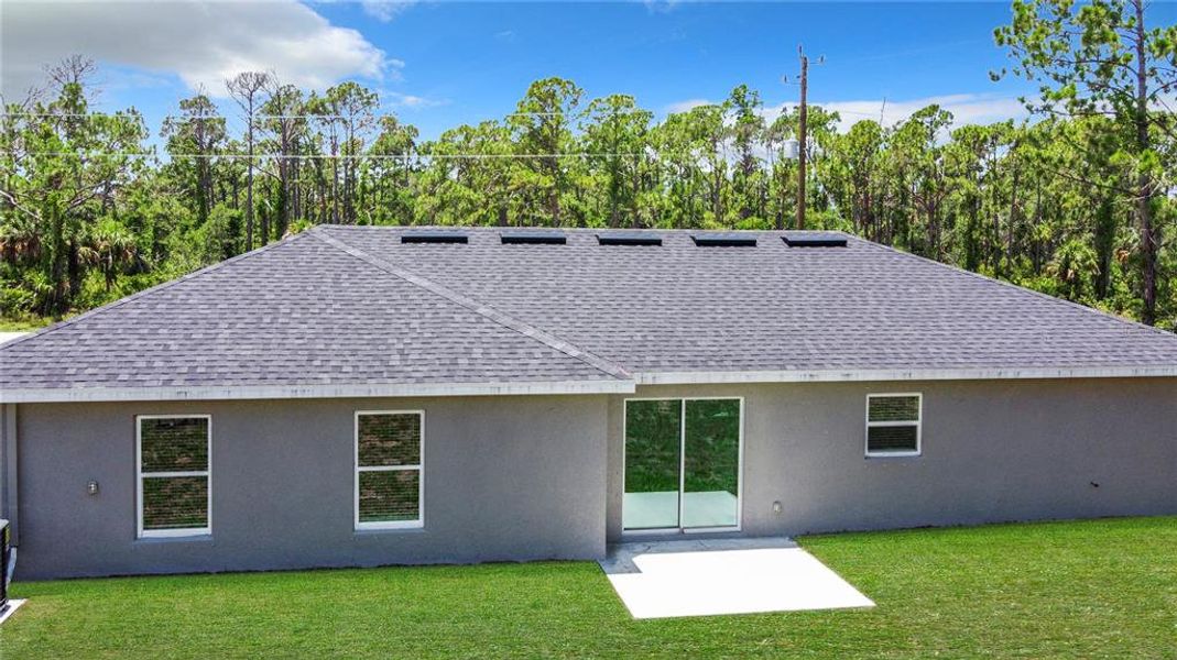 Front exterior of a new home in , Port Charlotte, FL, highlighting curb appeal (Image 2).