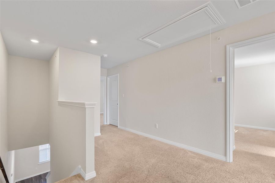 Upstairs Hallway with carpet, attic access, and recessed lighting Upstairs Hallway with carpet, attic access, and recessed lighting