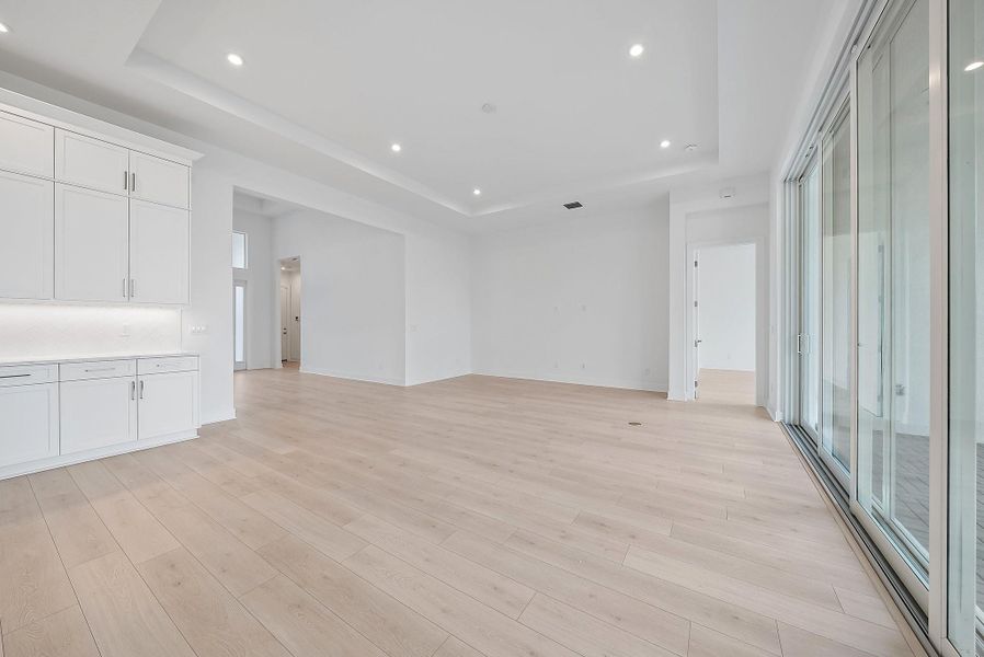 Spacious, unfurnished interior of a new home in L'Ambiance at Avenir, Palm Beach Gardens (Image 40).